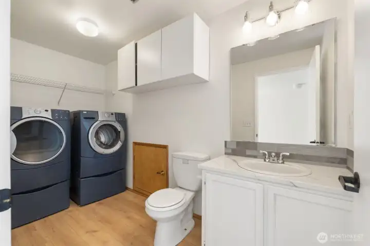 Half Bathroom and Laundry Lower level Half Bathroom and Laundry Lower level