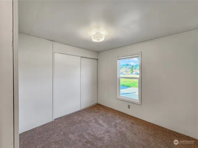 The second bedroom offers comfort and convenience with direct access to the hall bath, ensuring privacy and ease for guests. Large closet for storage, this thoughtful layout enhances the functionality of the home