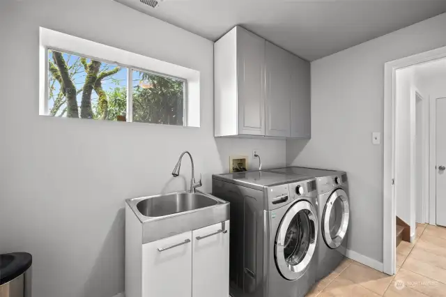 Lower level Laundry room/mudroom off double garage. Plenty of storage.