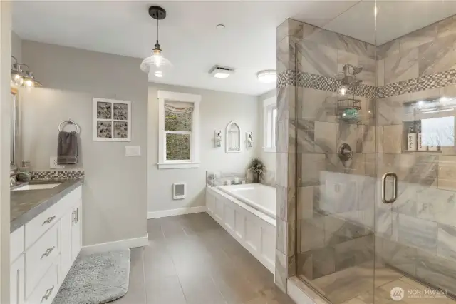 Large 5 piece primary bath with beautiful tile work.