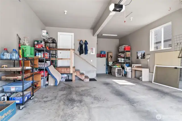 two car garage with additional storage space