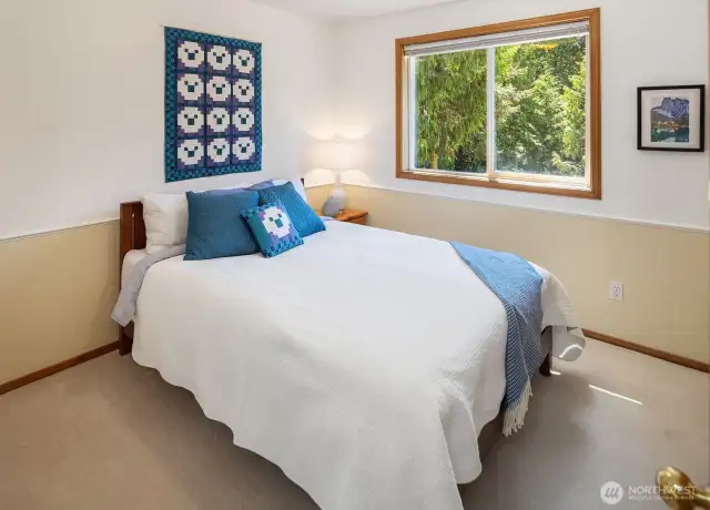 Guest bedroom #1 can easily accommodate this queen-size bed.