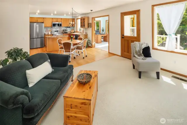 Kitchen flows to both the family room and flex room through the French doors.  Exterior door accesses back deck.