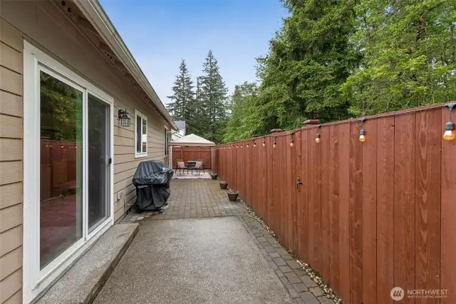 Pretty paver low-maintenance fully fenced back yard