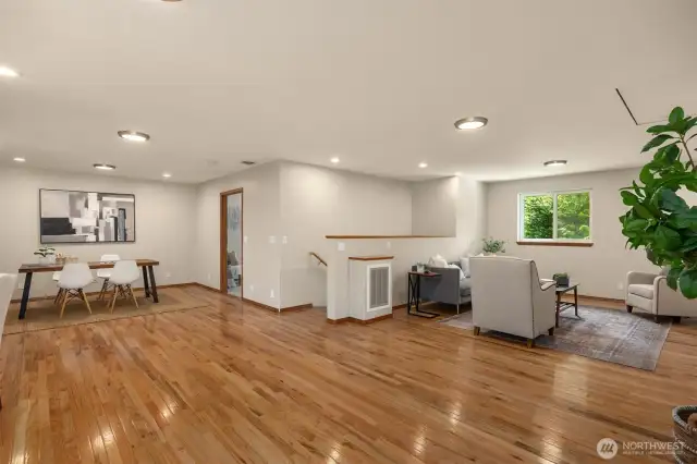 Head upstairs to the large bonus area with hardwood floors