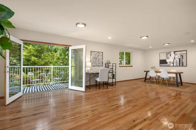 The upstairs features French doors with views to the back forest.