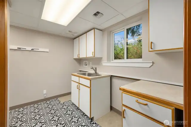 Laundry area off the great room/kitchen and by the entrance to the garage