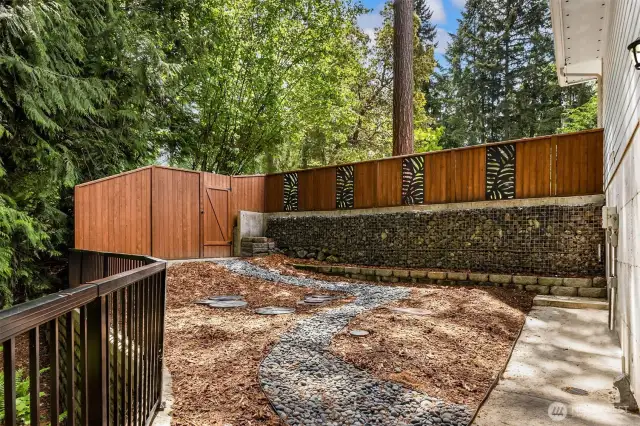 Fenced side yard with access from the basement or the front of the home.