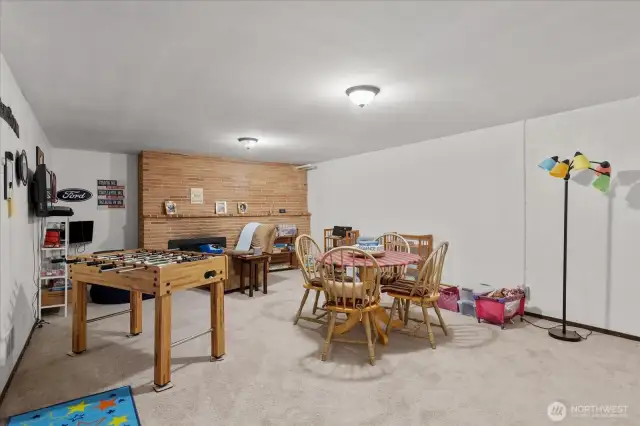 Spacious bonus room—ideal for game nights or movie marathons * Cozy brick accent wall adds warmth and character