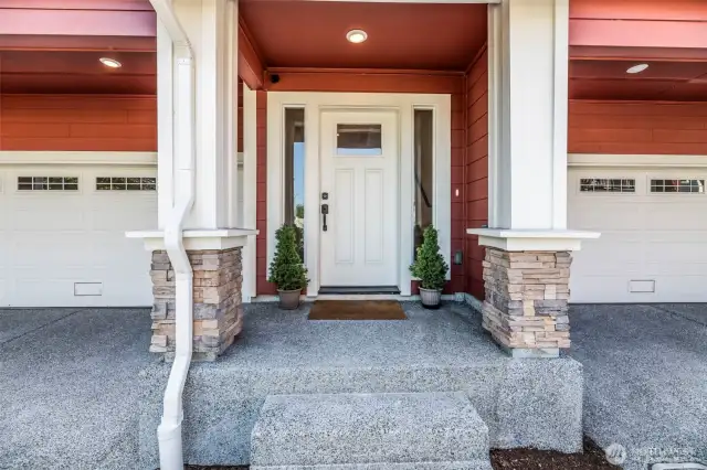 Entryway, garage door for unit is on the left