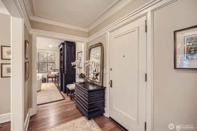 formal entry offers a grand arrival room to drop keys hang coat and fell as if you have stepped in to a penthouse style arrival