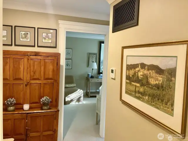 hall to primary bed offers more room for art and your special pieces of furniture