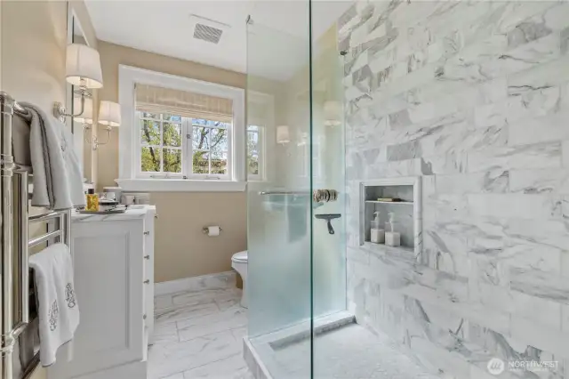 remodeled to a timeless design, full height marble surround - rain shower head- frameless over sized glass shower with lovely patterned marble floor