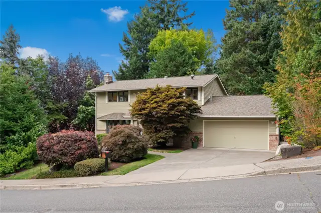 Welcome to 15240! Enter through garage or front door via lush garden pathway.