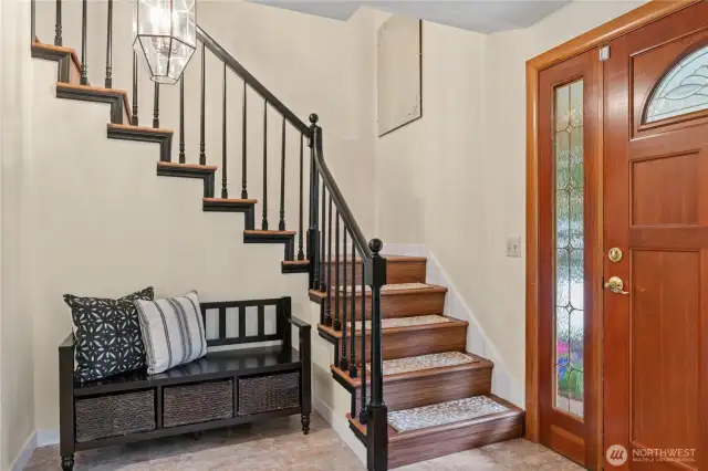 Come on in! Front entryway with bench nook and coat closet.