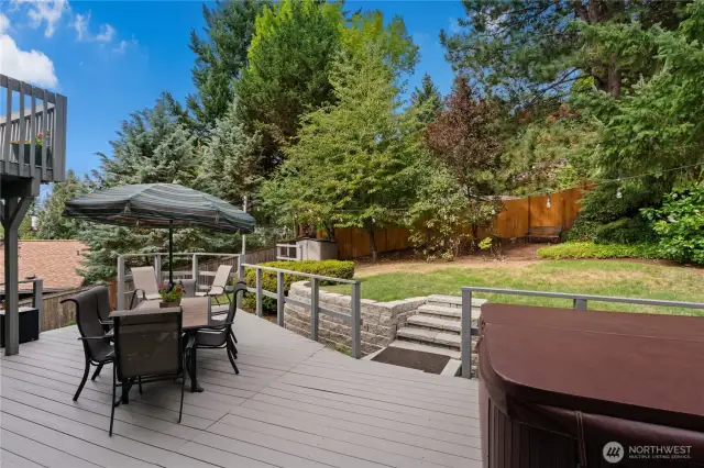 Step out to the back deck for enjoying a meal outside, firing up the grill, or soaking in the hot tub. (Sellers open to taking hot tub with them if buyers request.)