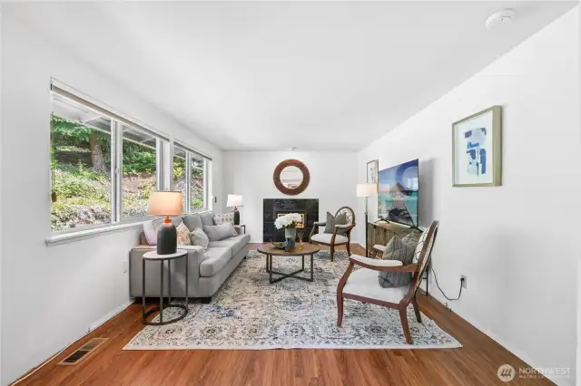 Family room connects to kitchen, close french doors for bonus office, play, or guest space.