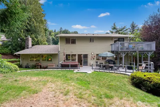 Great secluded backyard area with newer deck space as well as lawn, all with mature landscaping.