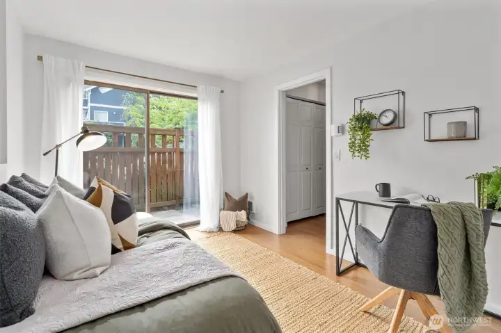 The sliding glass door off the second bedroom takes you out to one of the two outdoor areas this home provides.