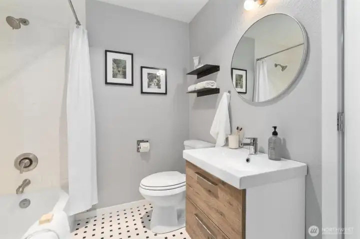 Full bathroom located on the lower level.