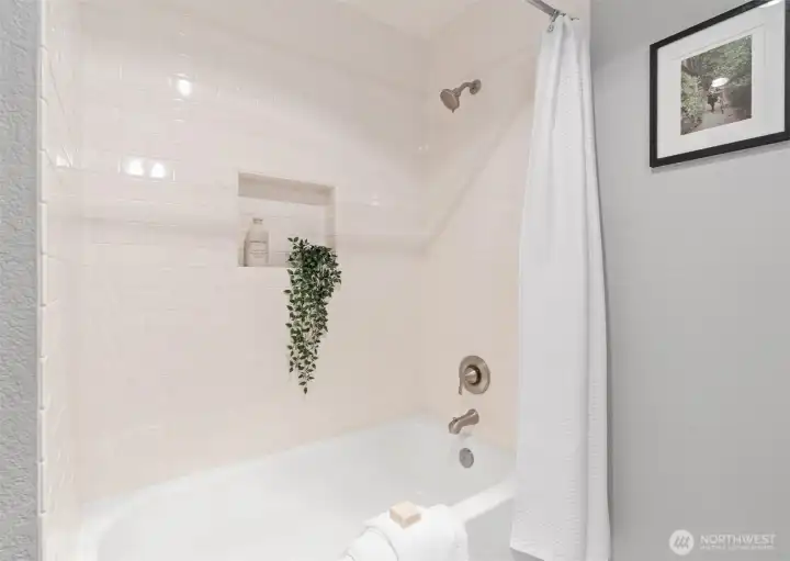 Full bathroom located on the lower level.