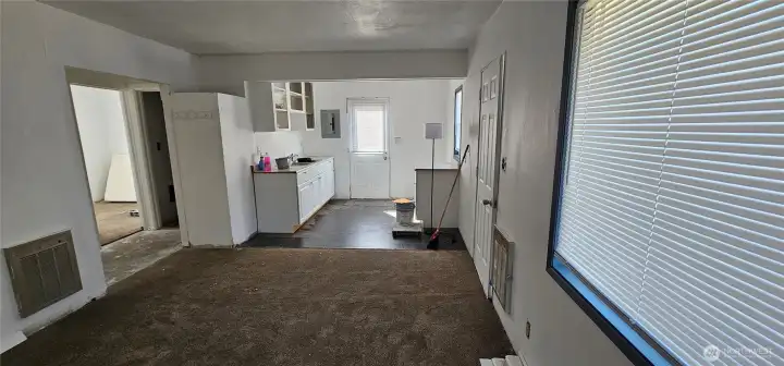 To the left is bath and 2 bedrooms
