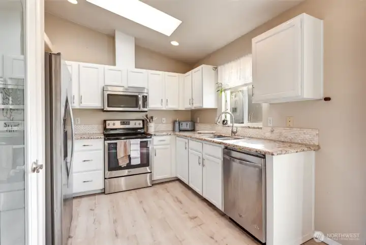 Nice appliances complement the updated kitchen