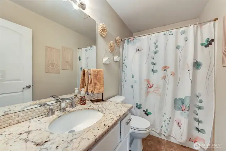 Full guest bath tastefully updated.