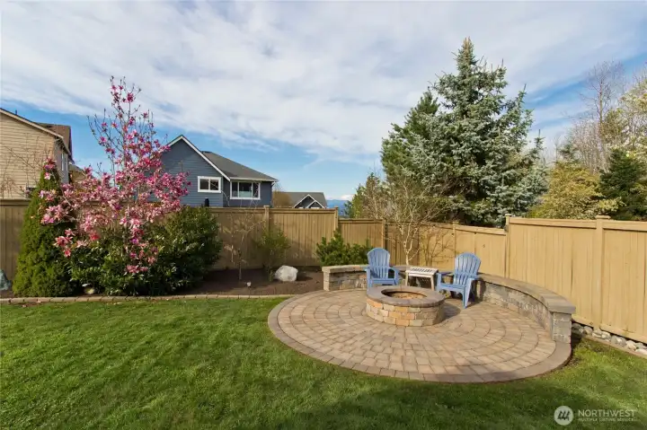 Custom Firepit with lighted bench seating.