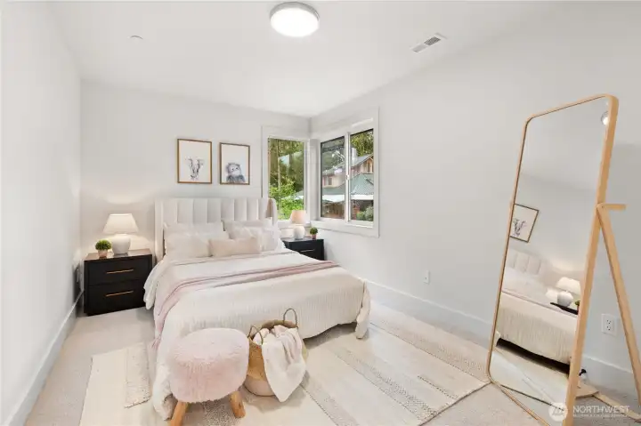 upstairs bedroom with built in closet shelving