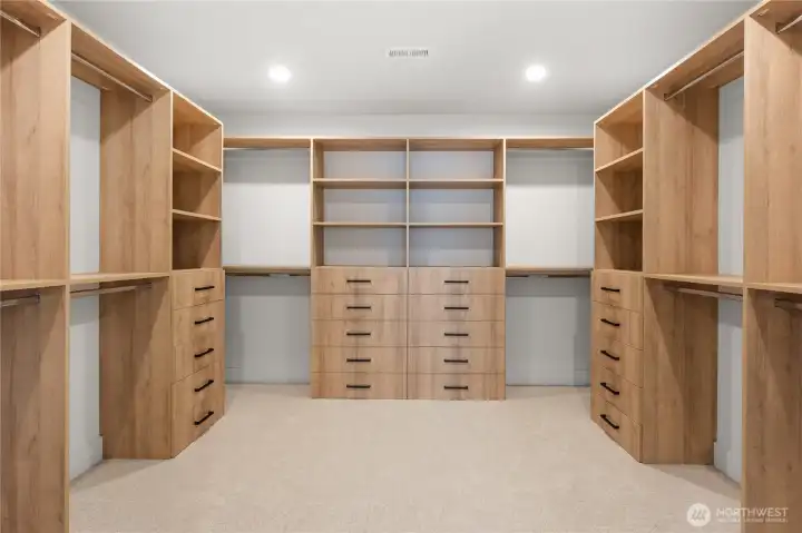 Massive custon built in cabinet primary walk in closet