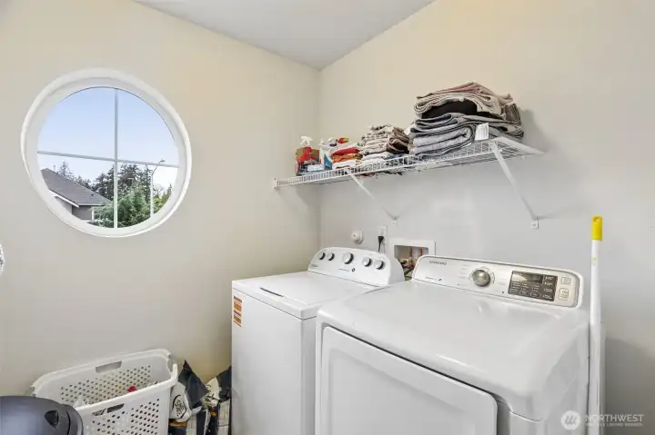 Upstairs laundry next to the bedrooms