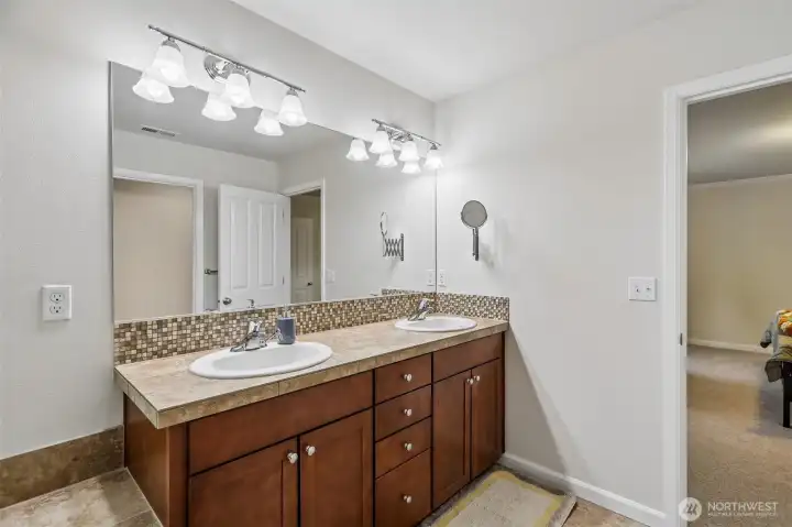 Primary bathroom double vanity sinks