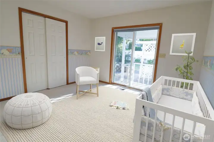A glimpse of how the main floor bedroom could come together as a nursery, with its own slider out to the back deck. Virtually staged.