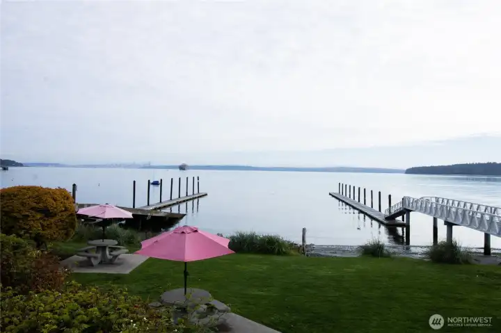 An aerial view of the Manchester waterfront, with its dock, beach, and walkable village