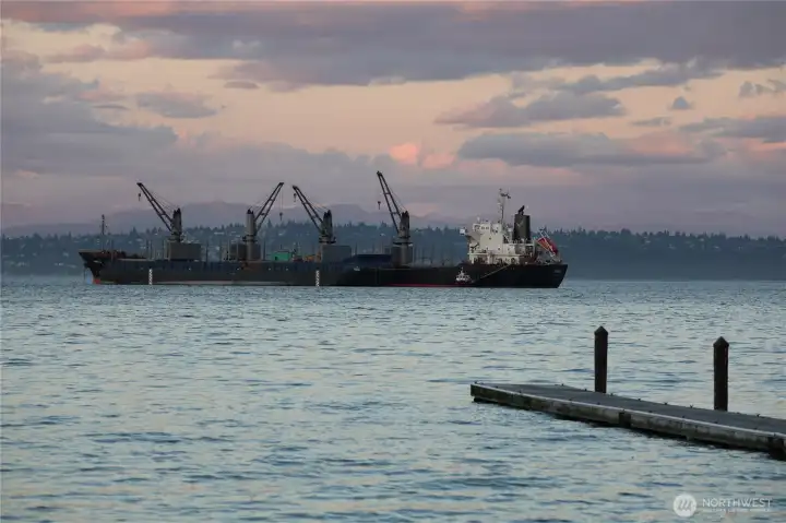 Evening on the water near Manchester, with the working boats of Puget Sound drifting by as the light fades.