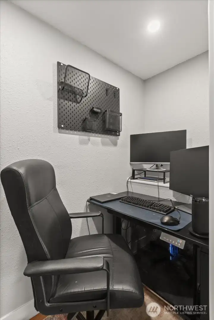 Office nook or use as extra storage closet. Pocket door closes off the space from the living space.
