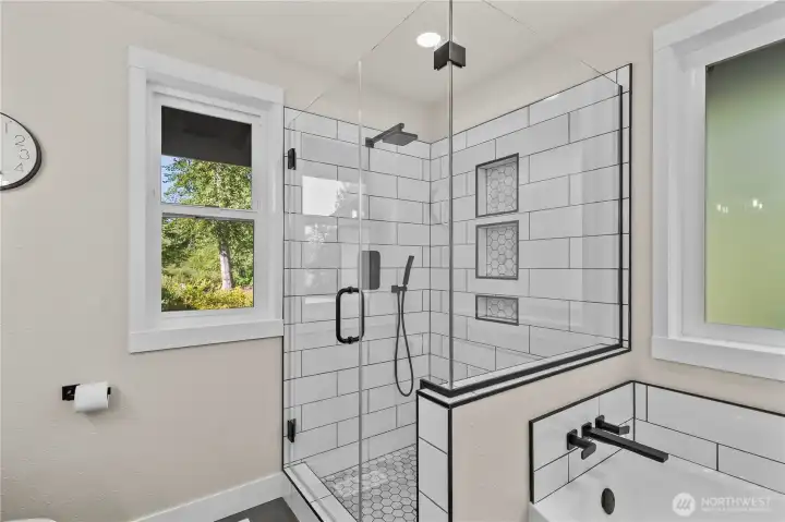 A true 5-piece Primary Ensuite Bathroom has been fully remodeled with high end details throughout.