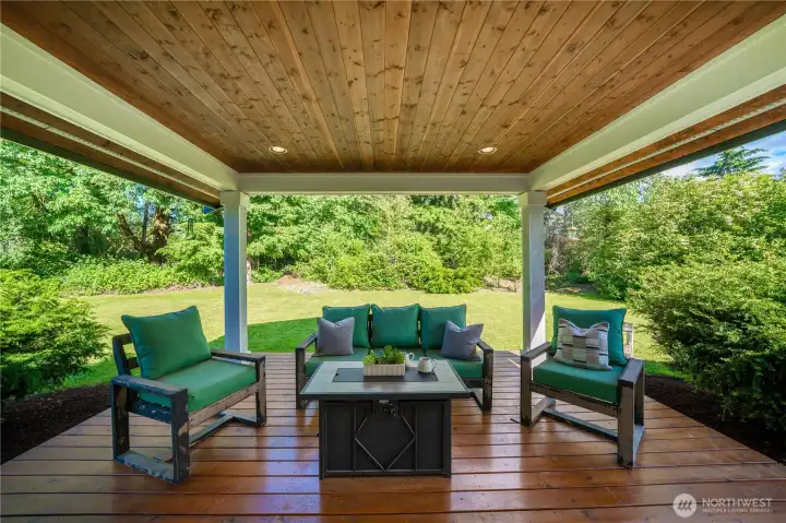 Covered deck was recently remodeled & can be accessed from both the kitchen and Primary bedroom. Tongue & groove ceiling with recessed lighting provides the perfect evening ambience for summer dinners & entertaining.