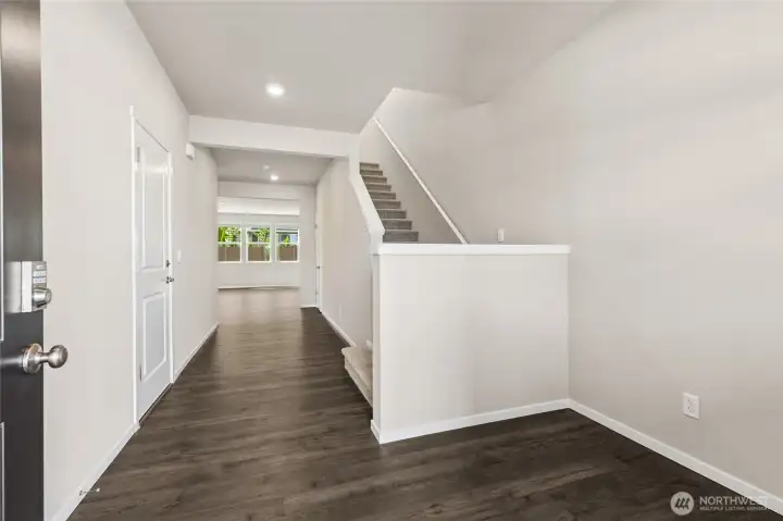Photo rendering is representational and may be virtually staged. Actual home is under construction and finishes, elevation, and paint colors may vary. See site agent for details.