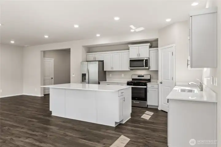 Photo rendering is representational and may be virtually staged. Actual home is under construction and finishes, elevation, and paint colors may vary. See site agent for details.