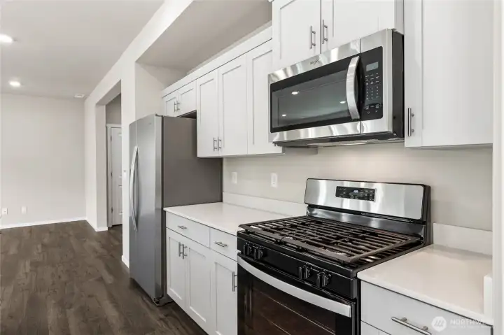 Photo rendering is representational and may be virtually staged. Actual home is under construction and finishes, elevation, and paint colors may vary. See site agent for details.