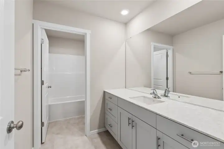 Photo rendering is representational and may be virtually staged. Actual home is under construction and finishes, elevation, and paint colors may vary. See site agent for details.
