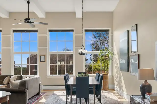 Walls of windows bathe the entire unit in natural light.