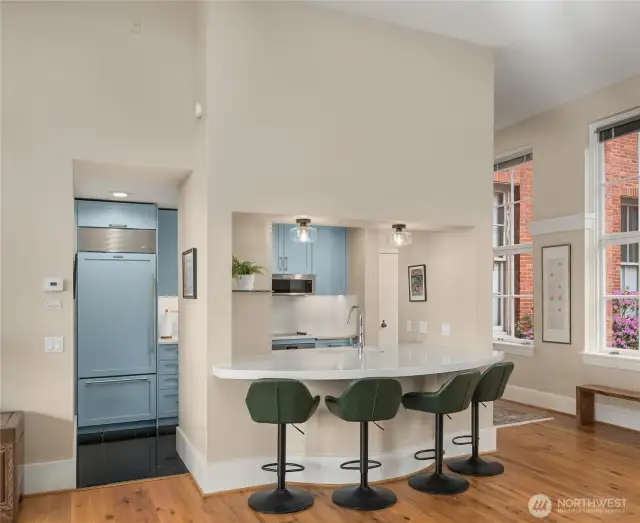 Stainless steel appliances complete with Sub Zero fridge.