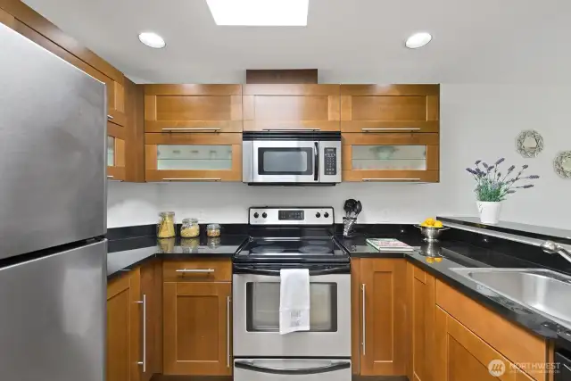 Good sized kitchen with pull up cupboards.