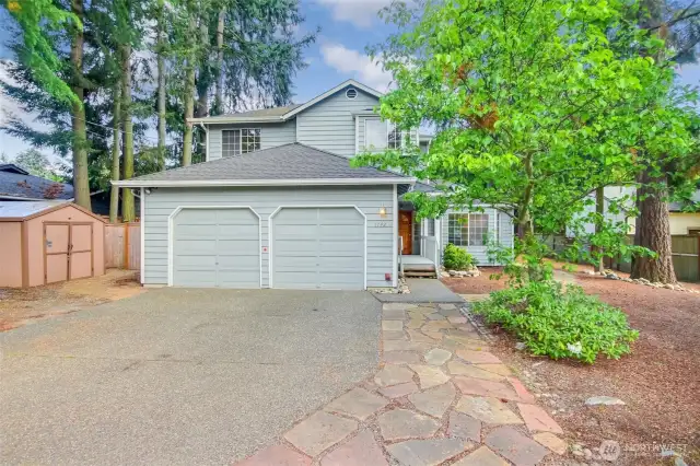Beautifully landscaped spacious home in Haller Lake Community.