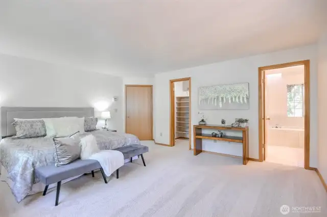 Another view of primary bedroom suite.
