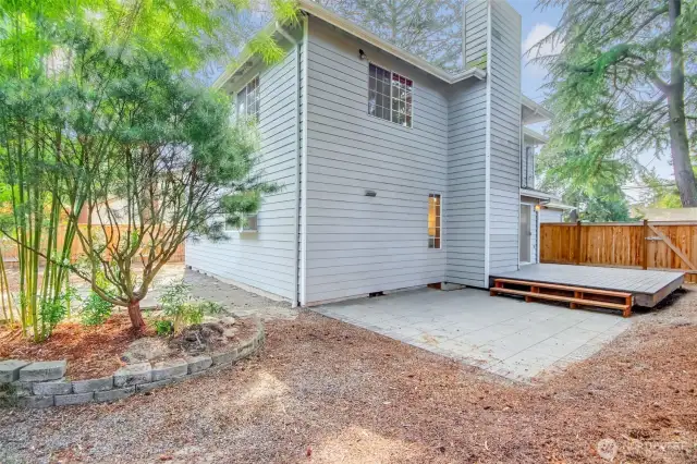 Deck off of rec room slider. Lots of patio space. Low maintenance yard.