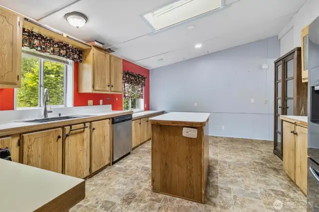 Kitchen with vaulted ceilings
